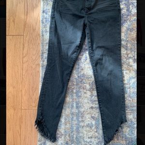 JOE’S black skinny jeans with raw hem ankle detailing